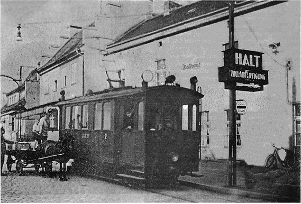 Tilsit-Elektrische_Bahn_nach_Miekiten_an_der_Luisen-Brücke